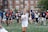 A close-up of a player cheering as they celebrate a victory in the game.
