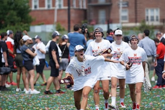 A diverse group of athletes celebrating at a sports event.