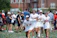 Young athlete celebrating a victory with teammates at the Birth of Champion event.