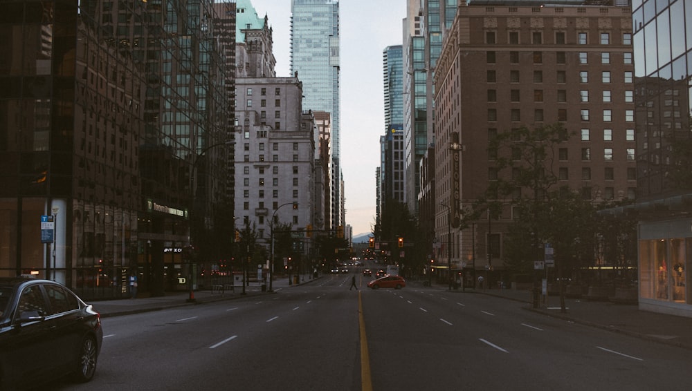 city buildings and gray pavement road