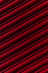 a close up of a red metal surface