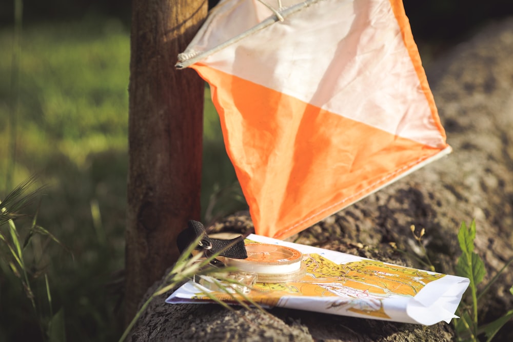 white and orange textile