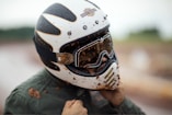person wearing white and black helmet