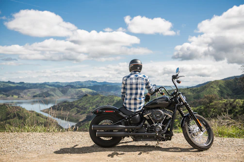 man sitting on the motorcycle