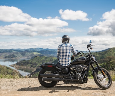 man sitting on the motorcycle