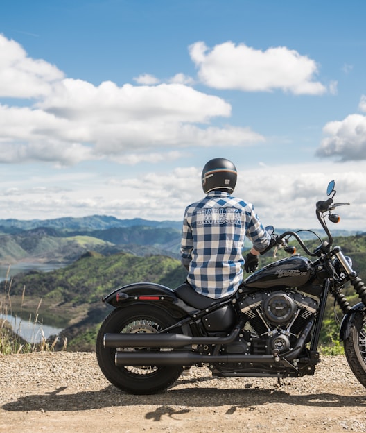 man sitting on the motorcycle