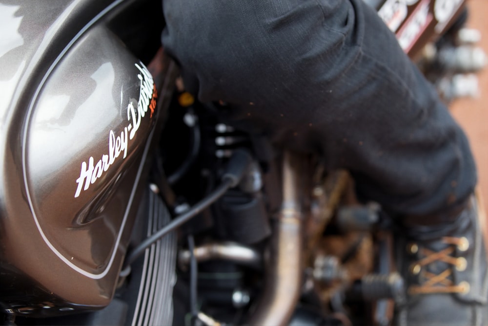 a person riding on the back of a motorcycle