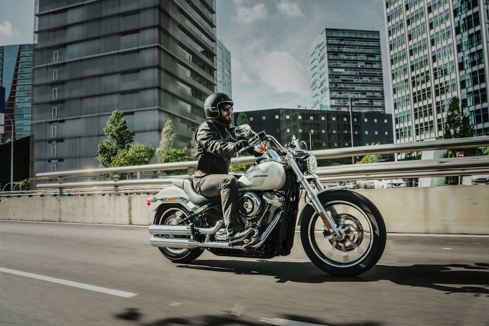 man riding cruiser motorcycle