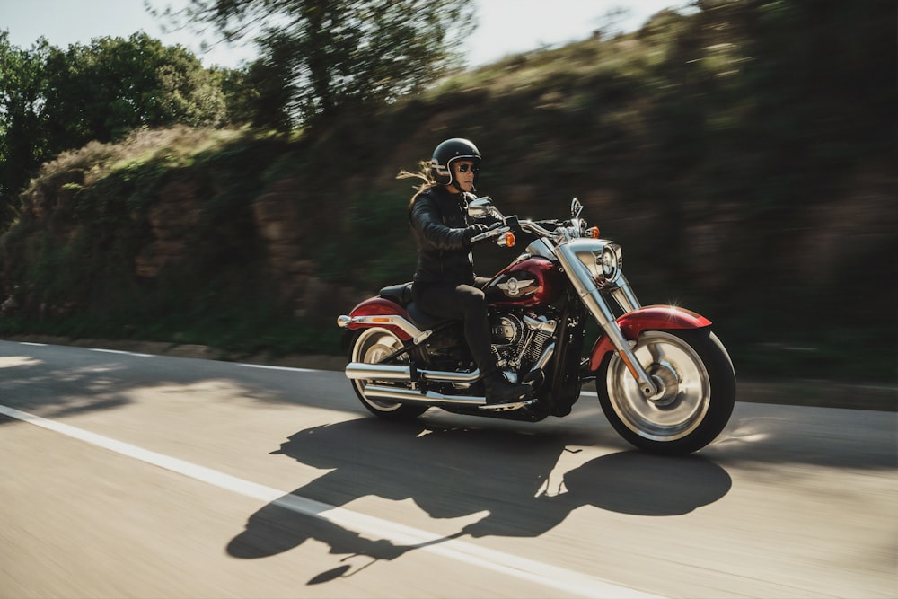 man on red cruiser motorcycle i