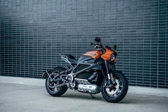 black and orange motorcycle