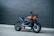 black and orange motorcycle
