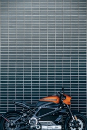 orange and black motorcycle