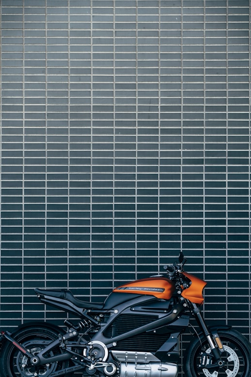 orange and black motorcycle