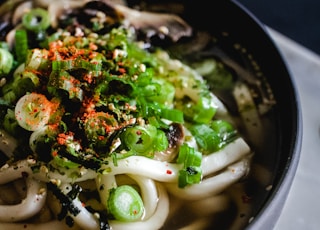 noodle soup on black bowl