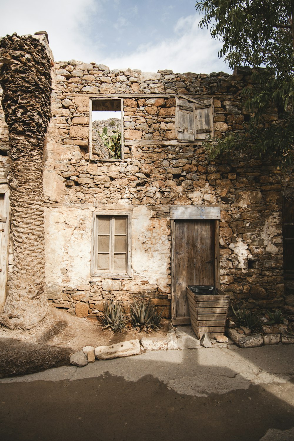 closed door and window stone house