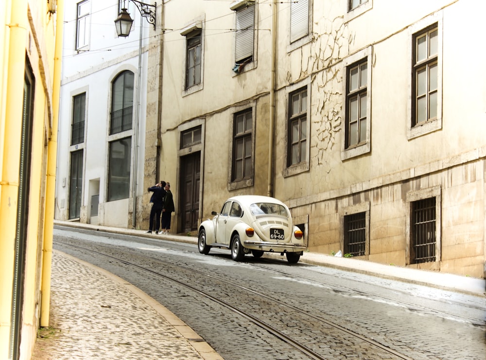 white Volkswagen Beetle