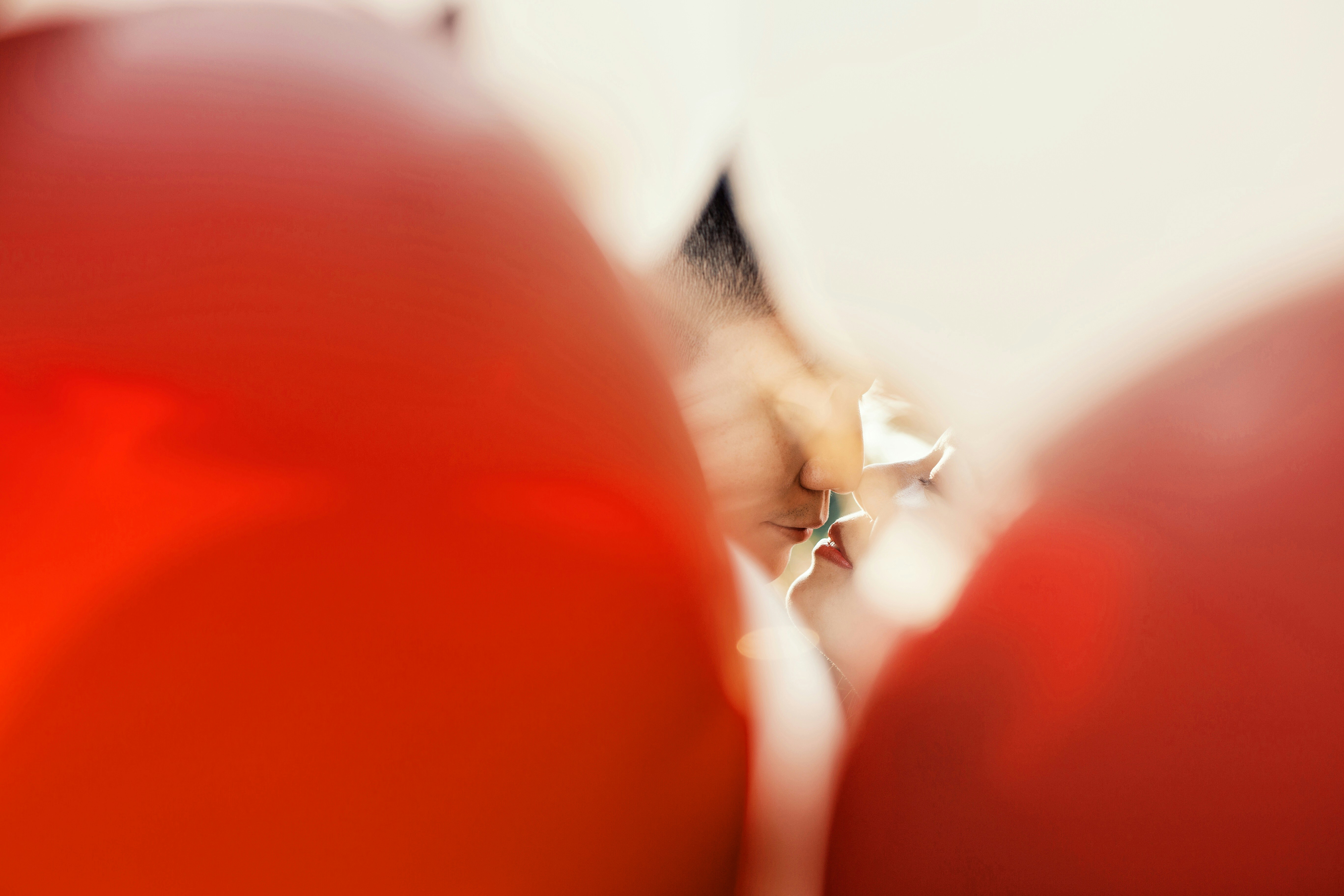 a close up of a bunch of red balloons
