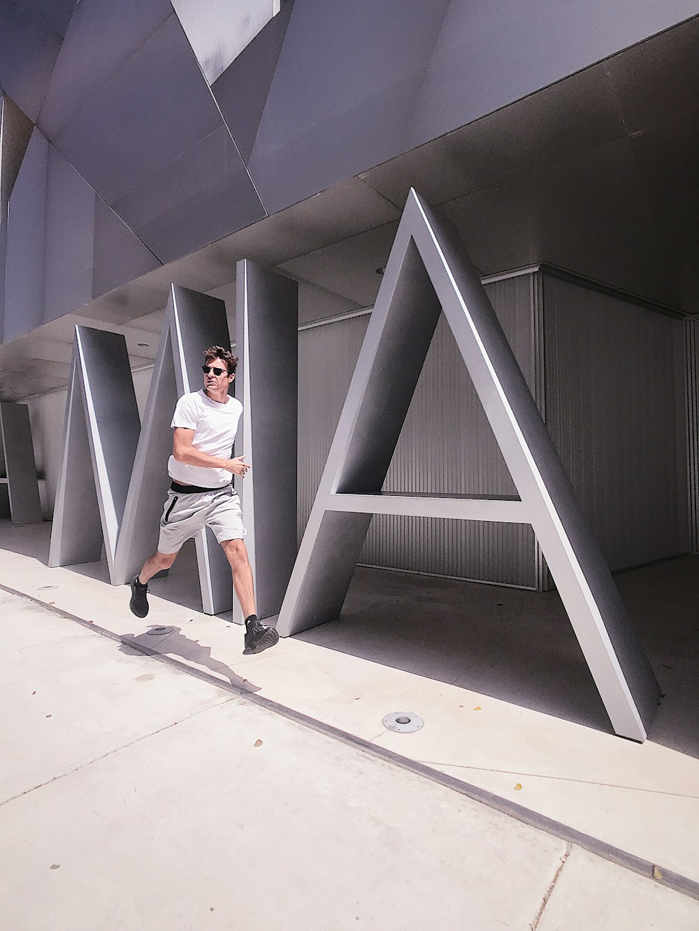 man running near building