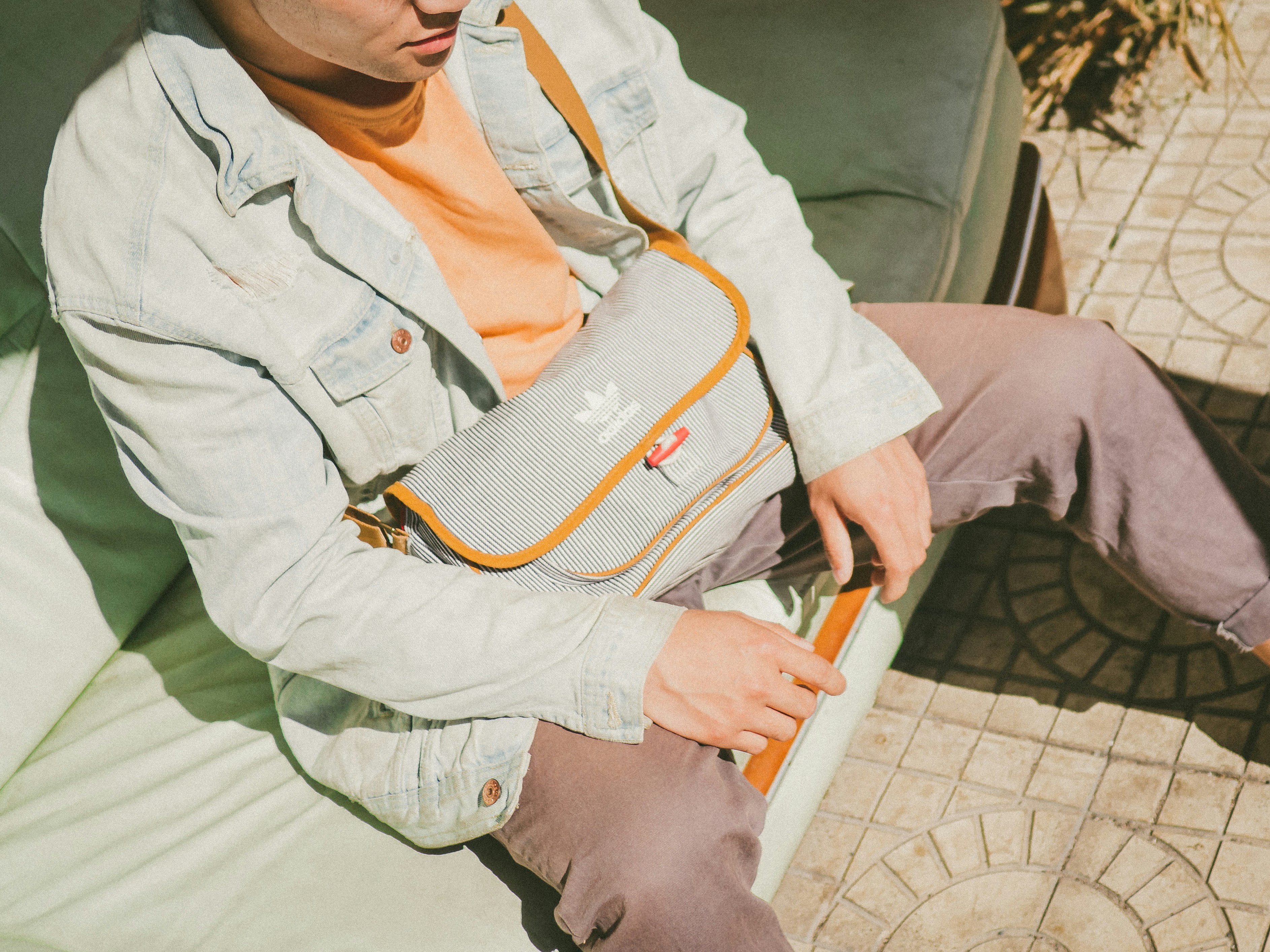 woman sitting on mattress