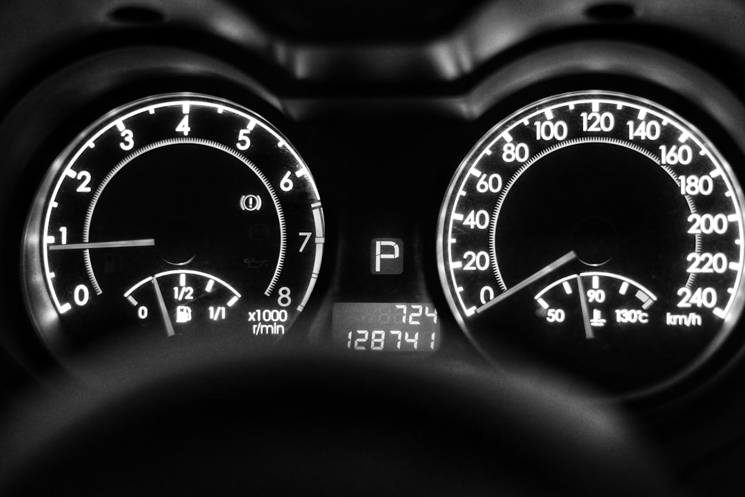 black vehicle instrument cluster panel,