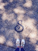 person wearing white shoes