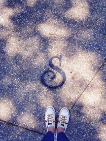 person wearing white shoes