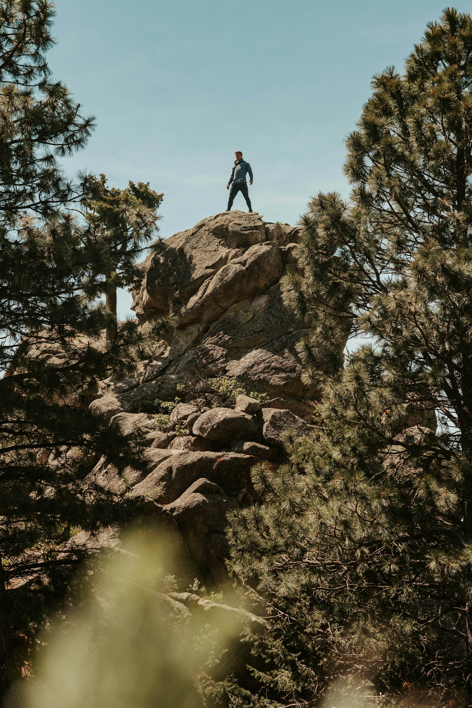 Sigma 50mm F1.4 DG HSM Art sample photo. Person standing on rock photography