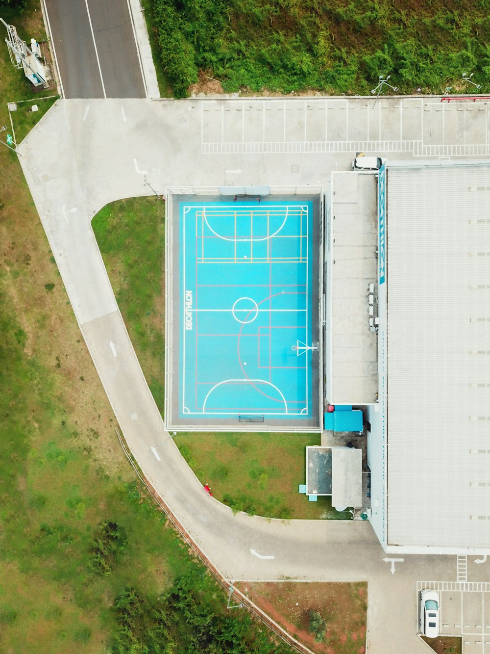 aerial photography of building near basketball court