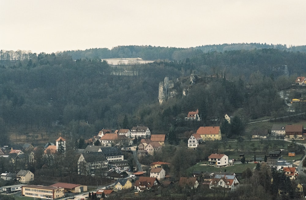 brown and grey buildings at the valley