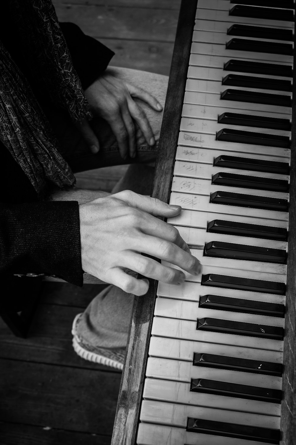 grayscale photography of upright piano