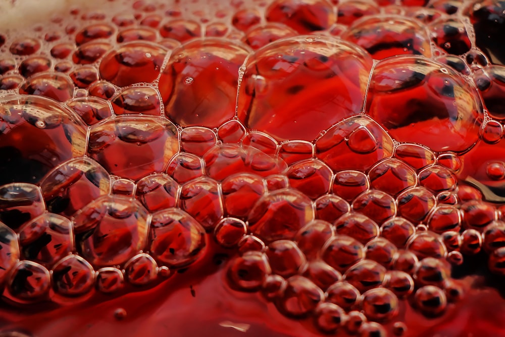 a close up of a bunch of red bubbles