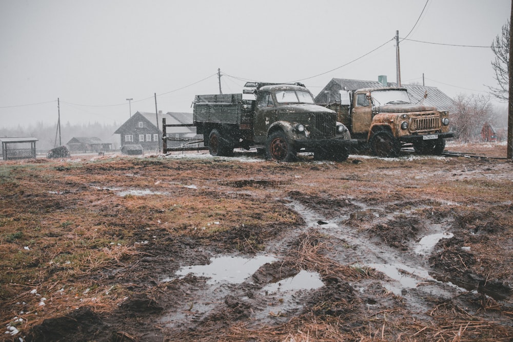 two trucks parked near electric post