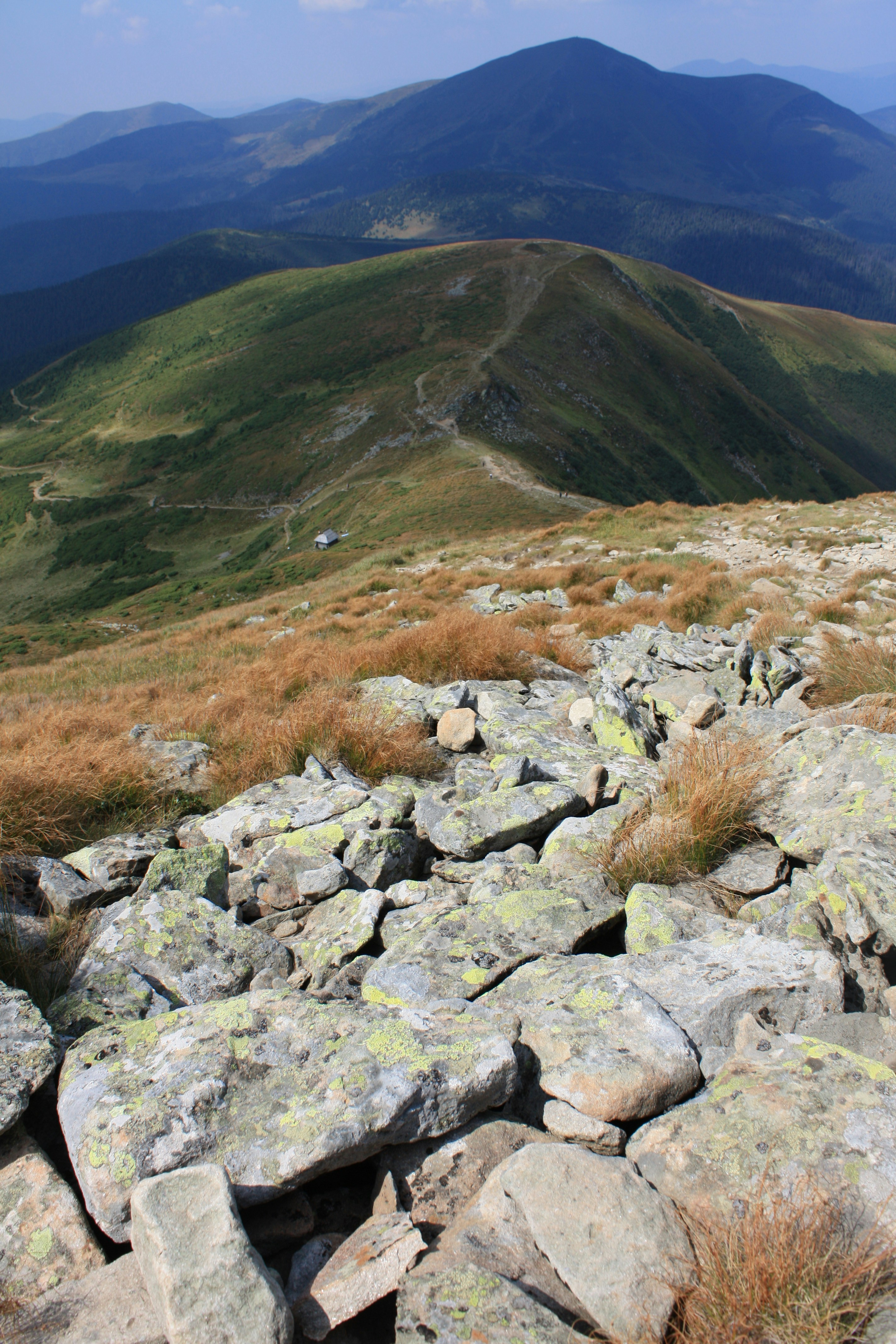 grey rocks on mountainside during daytime
