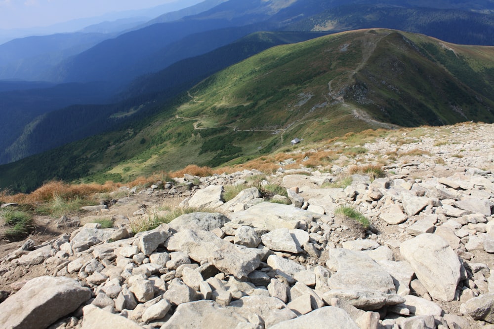 grey rocks on mountainside during daytime