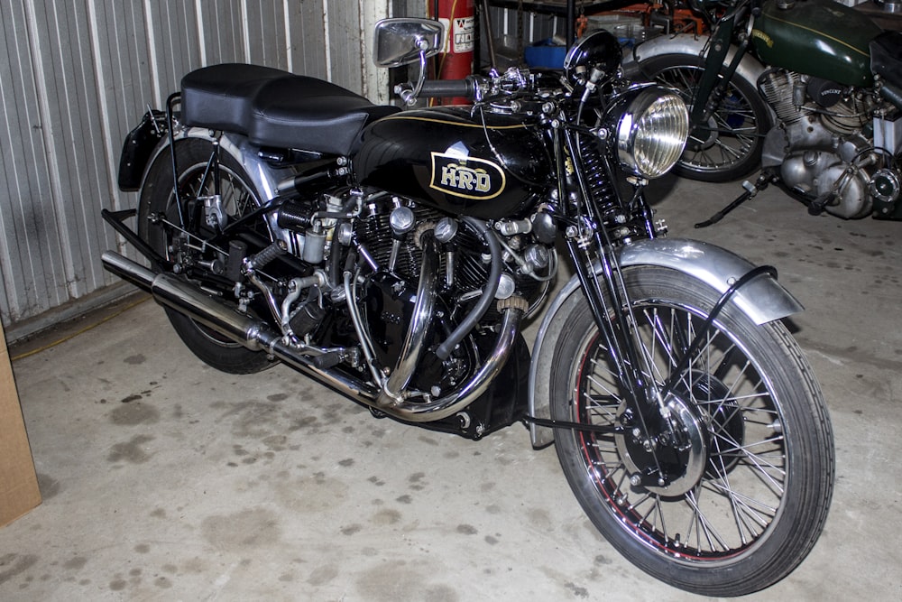 black classic HRD motorcycle in garage