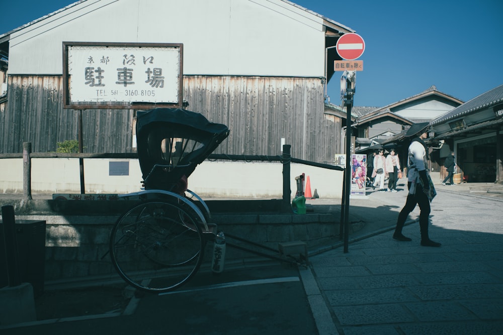 man standing near carriage