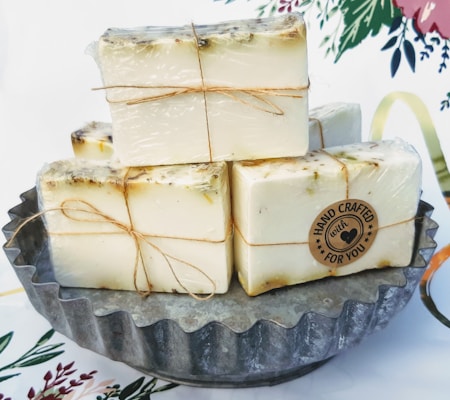 Handmade soaps arranged beautifully with natural ingredients.