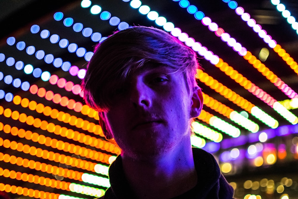 close-up photo of man during nighttime