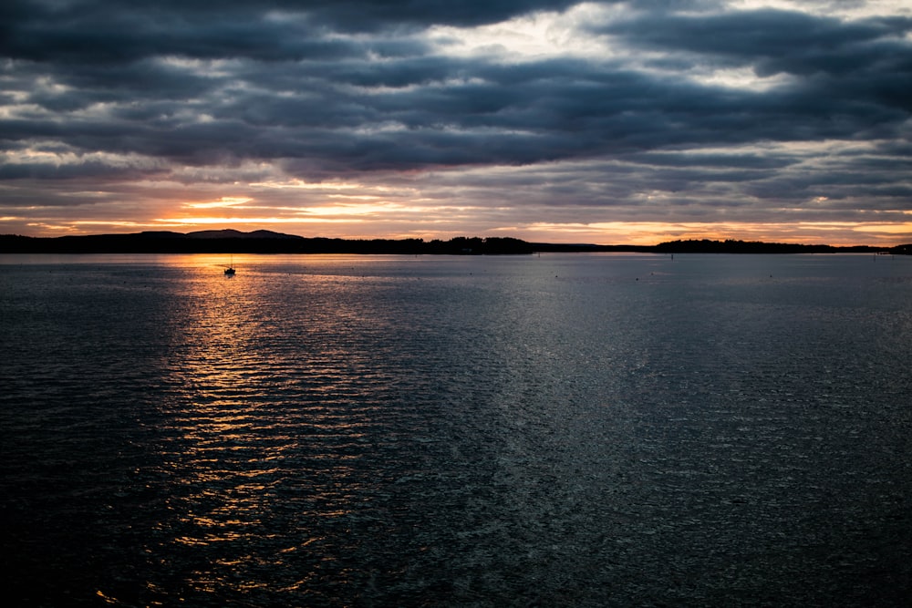 rippling water during sunrise