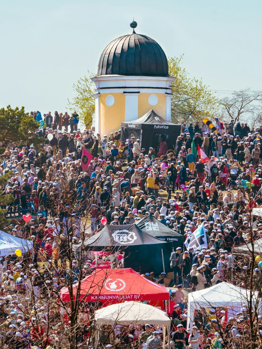 people gathering on mosque during daytime