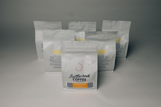 white coffee pack on white surface