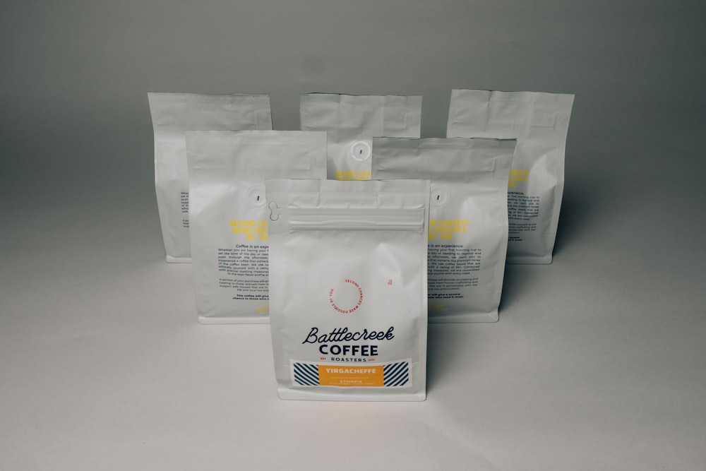 white coffee pack on white surface
