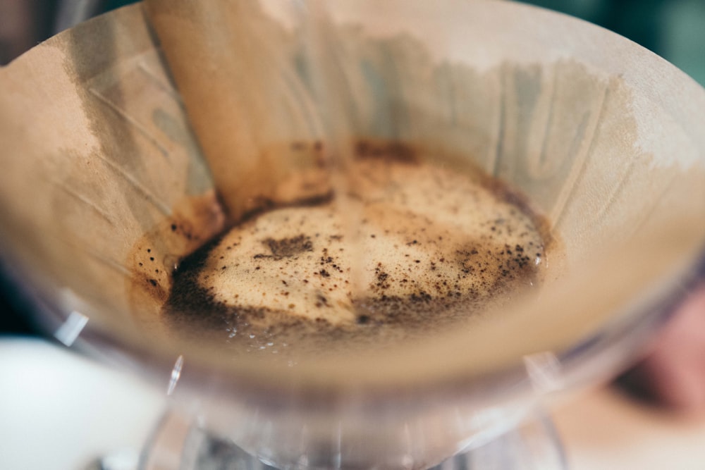 a blender filled with a mixture of brown liquid