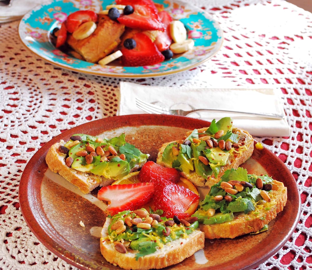baked bread with sliced fruits on brown plate