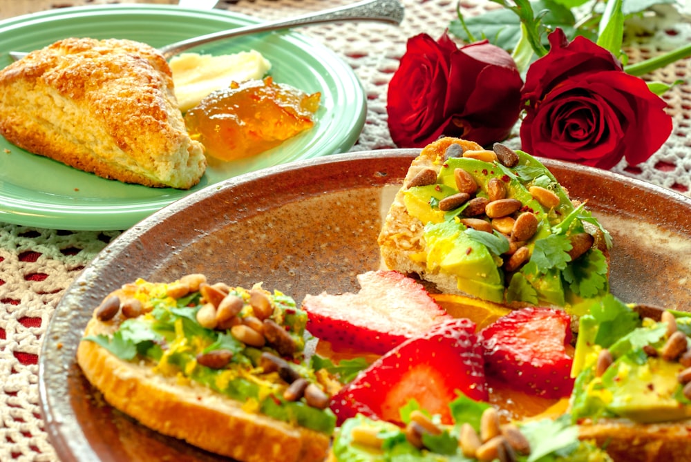 bread with avocado and strawberry tappings