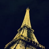A vibrant shot of the Eiffel Tower glowing at dusk, capturing the magic of Paris.