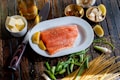 flat lay photography of raw salmon fish