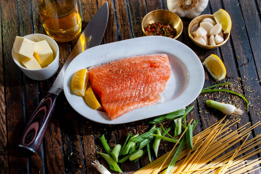 flat lay photography of raw salmon fish