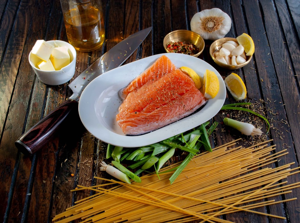 steamed salmon beside sliced of lemon