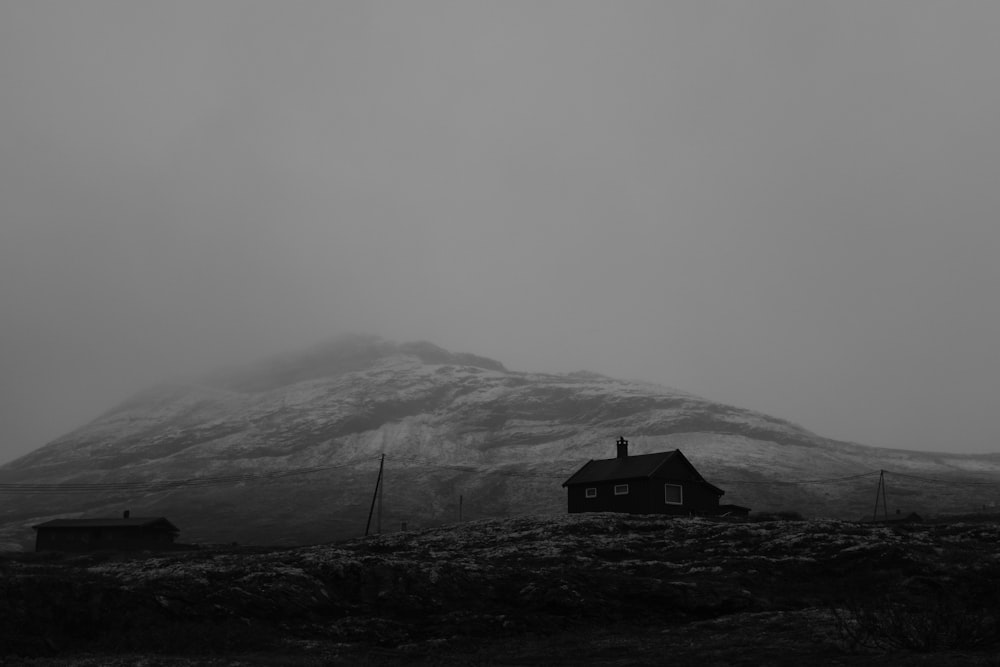 black house beside mountain